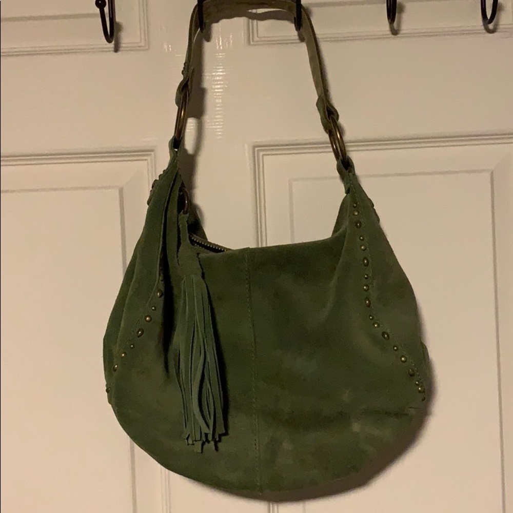 Suede green lucky purse. Used